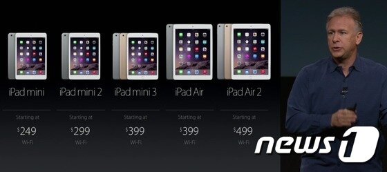 본문 이미지 - 애플이 16일(현지시간) 미국 캘리포니아주 쿠퍼티노에 위치한 본사 타운홀 강당에서 신형 태블릿PC 아이패드 에어2와 아이패드 미니3를 공개했다. ⓒ News1 2014.10.17/뉴스1