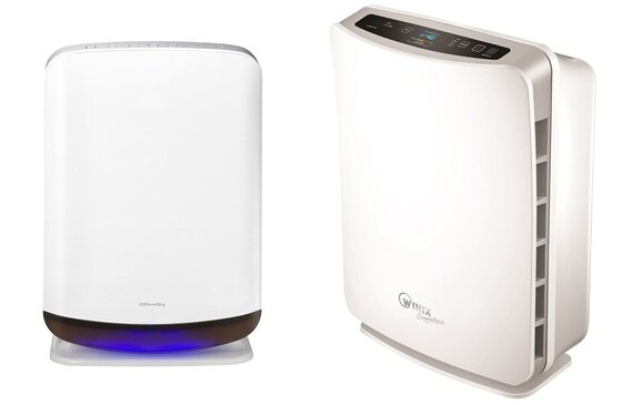 본문 이미지 - 코웨이 대용량 자연가습 공기청정기(왼쪽)과 위닉스 WACU300.© News1