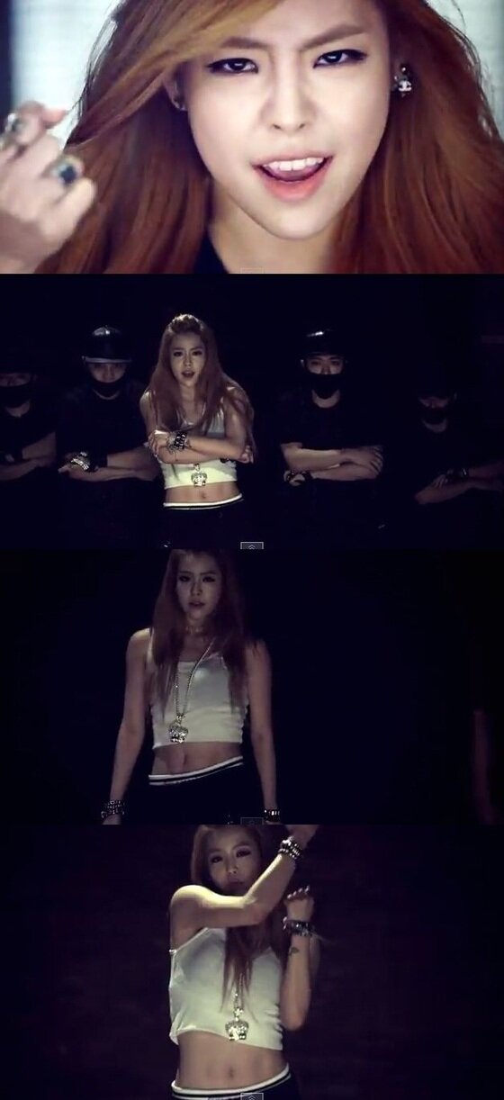 본문 이미지 - 신인가수 전민주가 11자 복근을 드러내며 건강미를 과시했다. © '비별' 뮤직비디오 화면 캡처 