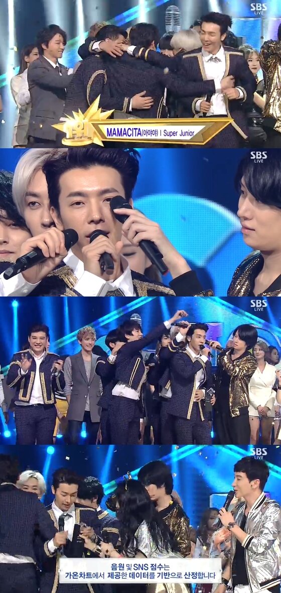 본문 이미지 - 슈퍼주니어는 14일 오후 2시30분 방송된 SBS &#39;인기가요&#39;에서 정규 7집 타이틀곡 &#39;마마시타&#40;MAMACITA&#41;&#39;로 걸그룹 씨스타와 신인그룹 위너를 제치고 1위 트로피를 품에 안았다. ⓒ SBS &#39;인기가요&#39; 캡처