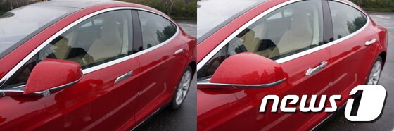 본문 이미지 - 테슬라 문의 손잡이. 주행중엔 차 안쪽으로 들어가 있어 공기 저항을 최소화한다.ⓒ News1