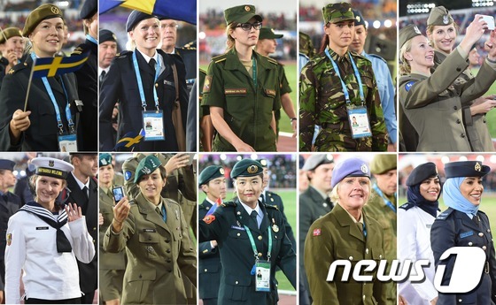 (문경=뉴스1) 최창호 = 2일 오후 경상북도 문경시 국군체육부대 주경기장에서 열린 2015 경북문경 세계군인체육대회 개막식에서 각국 여군 선수들이 입장을 하고 있다. 하나됨(TH …