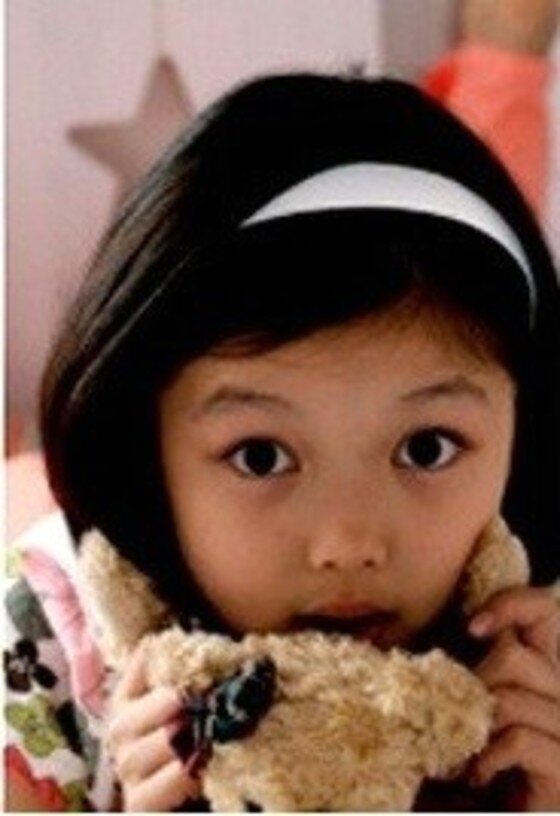 본문 이미지 -  김유정의 어린 시절이 새삼 화제다.  ⓒ News1 스타 / 온라인 커뮤니티