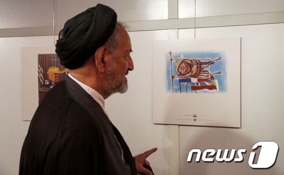 본문 이미지 - 국제 트럼프주의(Trumpism) 만화·캐리커처 전시회. ⓒ AFP=뉴스1