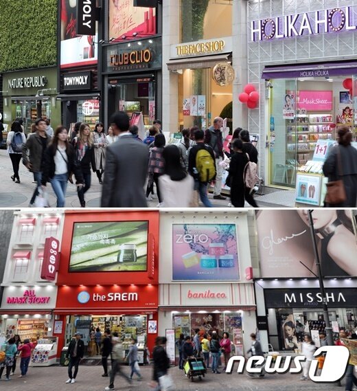 본문 이미지 - 서울 명동거리에 위치한 로드숍 화장품 매장 앞으로 시민들이 지나가고 있다. 최근 1세대 화장품 로드숍의 대표주자 가운데 하나였던 스킨푸드가 협력업체들에 줘야 할 대금과 채무를 이겨내지 못하고 결국 기업회생 절차를 신청했다.  2018.10.16/뉴스1 ⓒ News1 이재명 기자