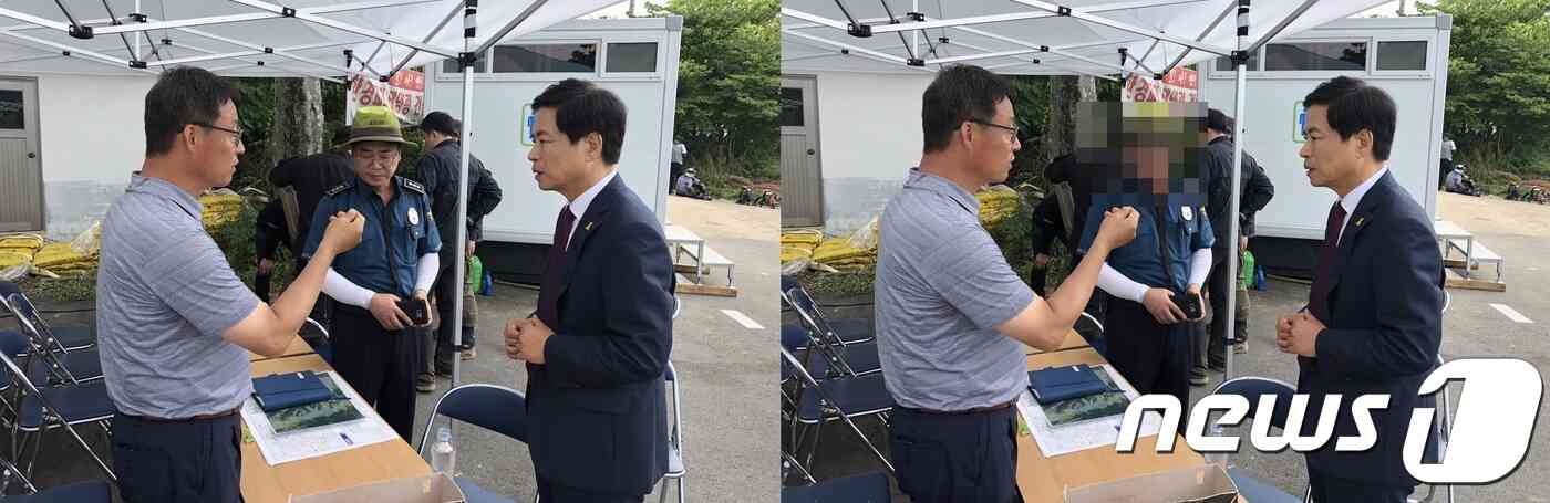 전남도교육청이 장석웅(오른쪽) 도교육감 당선자의 19일 강진 여고생 실종 수색본부 현장 방문 사진을 보도자료용으로 배포했다가 경찰관의 등산모자 쓴 모습이 나와자, 이를 모자이크 처리한 사진으로 교체했다.(전남도교육청 제공)/뉴스1 © News1