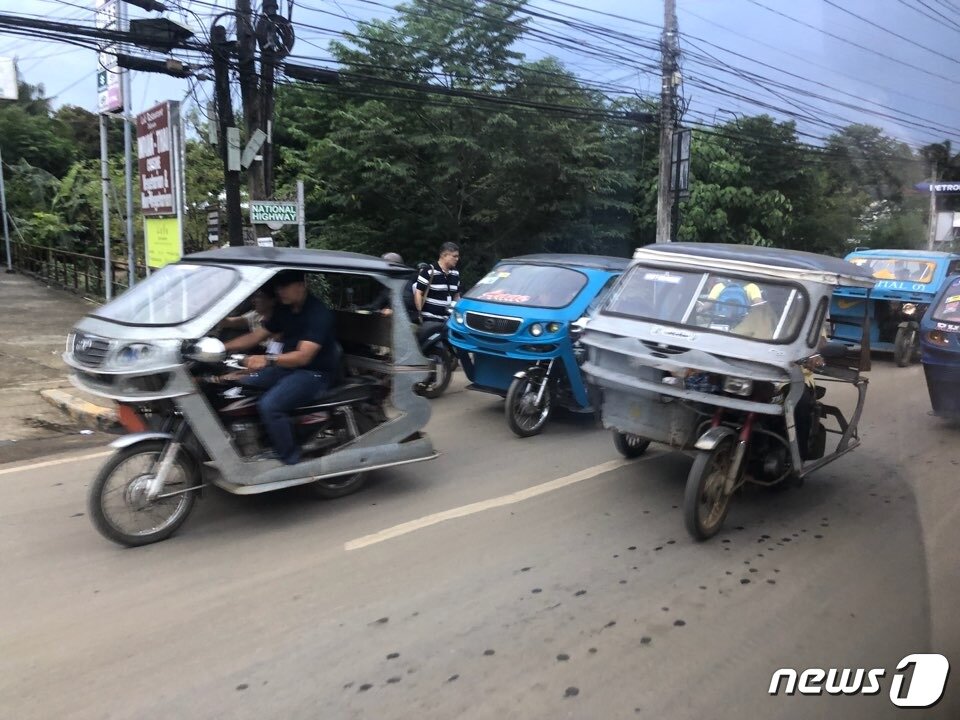 본문 이미지 - 팔라완의 퇴근 풍경. 필리핀도 퇴근거리는 붐비고 정신이 없었다. ⓒ News1 문대현 기자