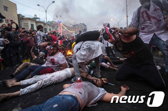 이라크의 수도 바그다드 타흐리르 광장의 반정부 시위 현장 © AFP=뉴스1