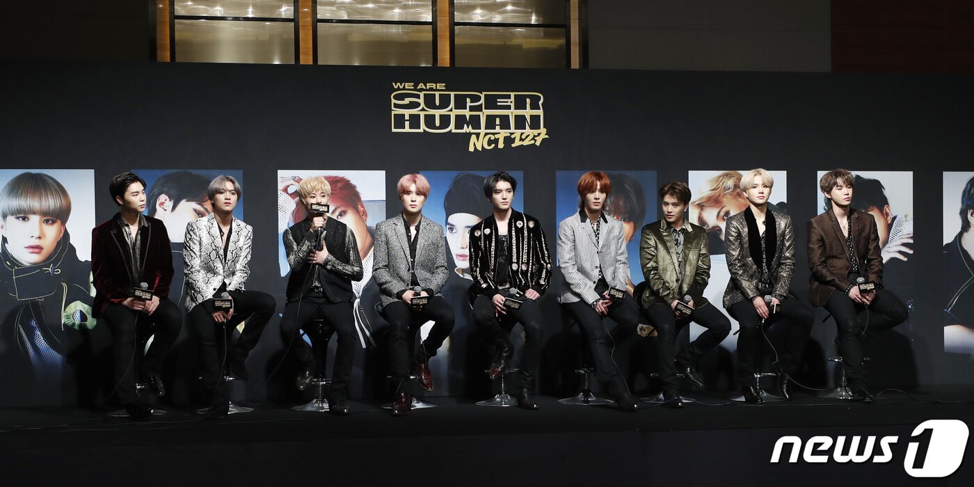 본문 이미지 - NCT127이 24일 오후 서울 영등포구 여의도동 콘래드 서울에서 열린 네 번째 미니 앨범 ‘NCT #127 위 아 슈퍼휴먼(WE ARE SUPERHUMAN)’ 제작발표회에 참석해 인사말을 하고 있다. 왼쪽부터 쟈니, 해찬, 마크, 재현, 태용, 유타, 태일, 정우, 도영. 이번 앨범에는 타이틀곡 ’슈퍼휴먼(Superhuman)’을 비롯해 '하이웨이 투 헤븐(Highway to Heaven)' ‘아 깜짝이야(FOOL)’ ‘시차(Jet LAG)’ ‘종이비행기(Paper Plane)’ '아우트로 : 위 아 127(OUTRO : WE ARE 127)'가 수록됐다. 2019.5.24/뉴스1 ⓒ News1 권현진 기자