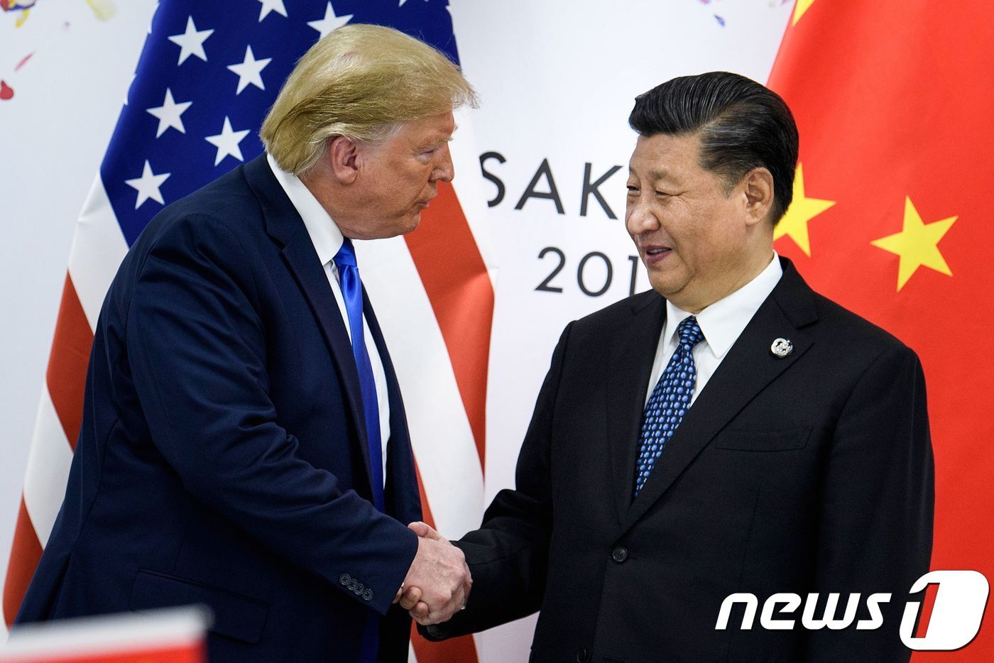 본문 이미지 - 도널드 트럼프 미국 대통령과 시진핑 중국 주석이 오사카 G-20에서 양국 정상회담을 갖고 있다. ⓒ AFP=뉴스1