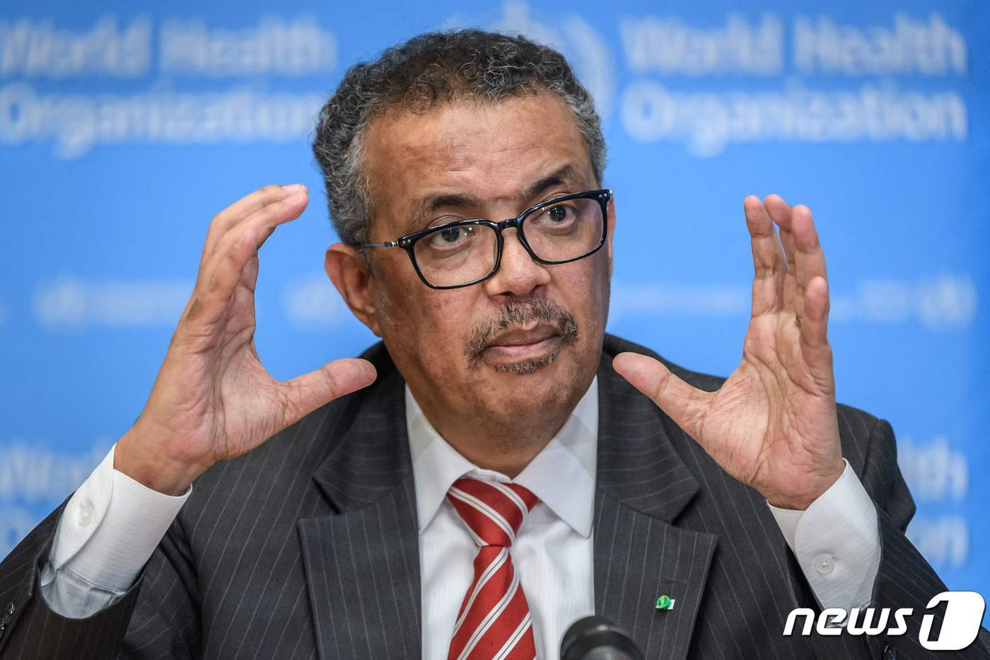 본문 이미지 - 테워드로스 아드하놈 거브러여수스 WHO 사무총장이 11일&#40;현지시간&#41; 제네바 WHO 본부에서 코로나19 &#39;팬데믹&#39;을 선언하고 있다. ⓒ AFP=뉴스1 ⓒ News1 우동명 기자