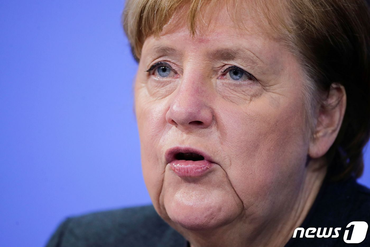 본문 이미지 - 앙겔라 메르켈 독일 총리가 코로나19 관련 기자회견을 하고 있다. ⓒ AFP=뉴스1 ⓒ News1 우동명 기자