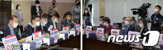 5일 오전 정부세종청사에서 국회 환경노동위원회의 환경부에 대한 국정감사에 앞서 더불어민주당 의원들과 국민의힘 의원들이 대장동 의혹 관련 팻말을 놓고 의사발언을 하고 있다. 더불어민주당 의원들은 '화천대유=아빠의힘 게이트, 50억이 산재위금?' 팻말을, 국민의힘 의원들은 '이재명 판교 대장동게이트 특검 수용하라' 팻말을 붙이고 있는 상태이다. 장수영 기자