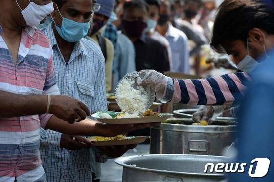 인도의 한 무료 배식소. (사진은 기사 내용과 무관함) / 뉴스1 © News1 © AFP=뉴스1