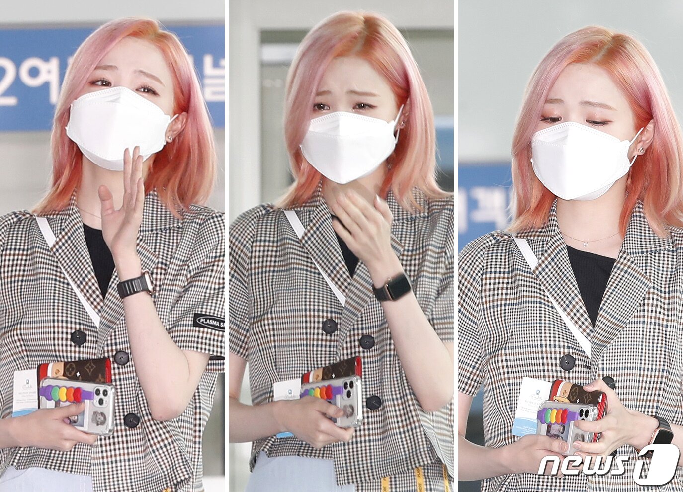 본문 이미지 - 혼다 히토미가 아이즈원 계약 종료일인 19일 인천공항에 도착해 팬들의 뜨거운 응원 속 눈물을 흘리며 출국장으로 이동하고 있다. 2021.4.19/뉴스1ⓒ News1 권현진 기자