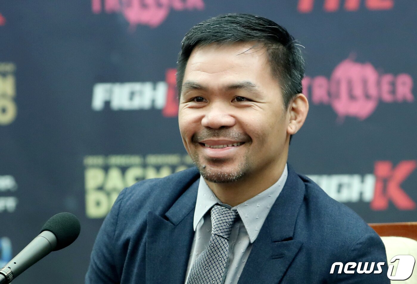 본문 이미지 - '필리핀 복싱 영웅' 매니 파퀴아오가 11일 오전 서울 중구 소공동 프레스센터에서 열린 파퀴아오 VS DK YOO 매치 기자회견에서 미소를 짓고 있다. 2022.10.11/뉴스1 ⓒ News1 권현진 기자