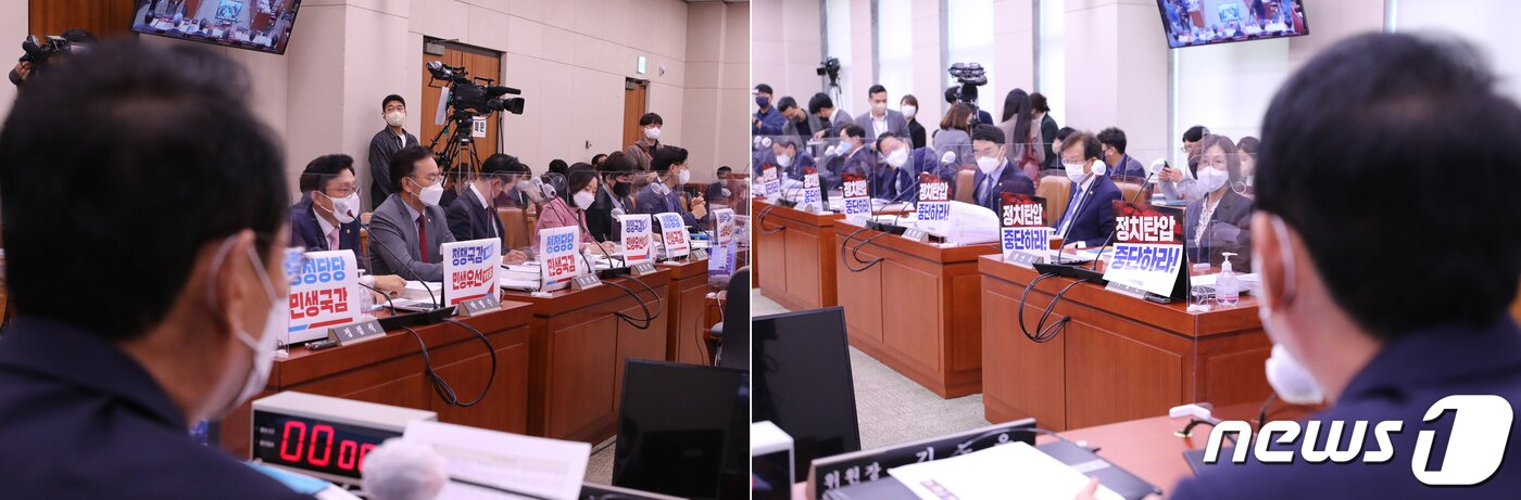 본문 이미지 - 4일 서울 여의도 국회에서 열린 대법원 등에 대한 법제사법위원회 국정감사에서 더불어민주당(오른쪽)이 '정치탄압 중단하라'고 적힌 피켓을 붙이자 국민의힘에서 '정쟁국감NO 민생국감 YES'라고 적힌 피켓을 붙여 놓고 있다. (공동취재) 2022.10.4/뉴스1 ⓒ News1 유승관 기자