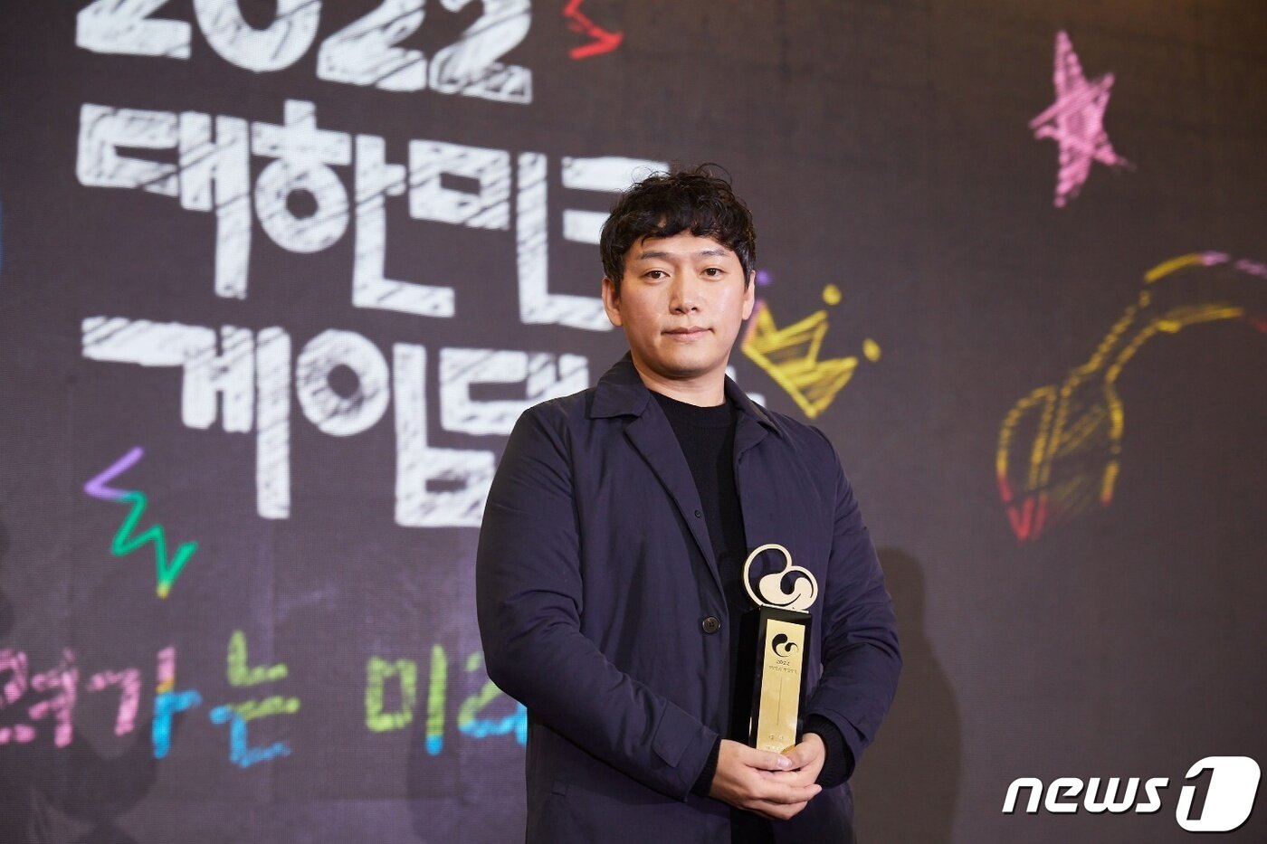 본문 이미지 - '2022 대한민국 게임대상'에서 대통령상(대상)을 수상한 '던전앤파이터 모바일' 개발사 네오플의 윤명진 이사(넥슨 제공)