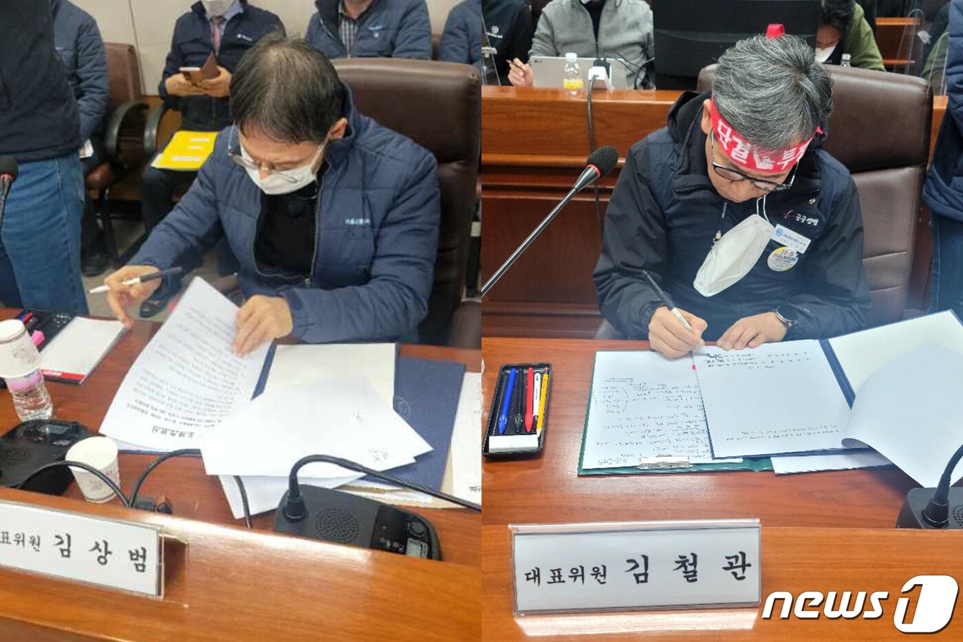 본문 이미지 - 서울 지하철을 운영하는 서울교통공사 노사간 본교섭이 1일 자정 무렵 극적 타결됐다. 이날 서울교통공사에서 김상범 서울교통공사 사장(왼쪽)과 김철관 교섭 대표위원이 합의서에 서명을 하고 있다. (서울교통공사통합노조 제공) 2022.12.1/뉴스1 ⓒ News1 임세영 기자