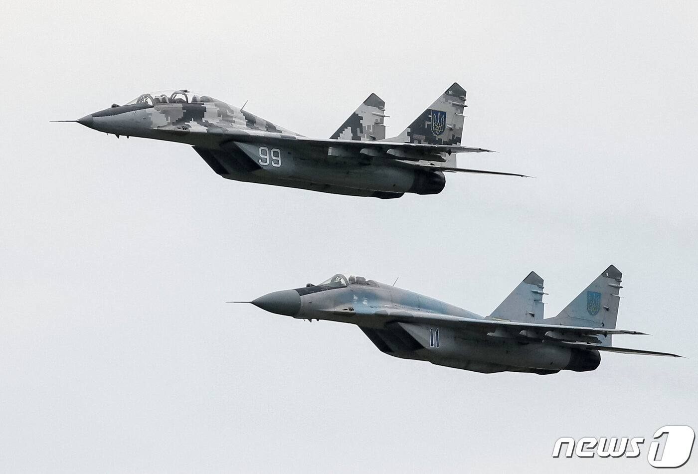 본문 이미지 - 미그-29&#40;MIG-29&#41; 전투기가 2016년 8월3일&#40;현지시간&#41; 우크라이나 군사 공군 기지를 비행하고 있다. 2016.08.03/news1 ⓒ 로이터=뉴스1 ⓒ News1 김민수 기자