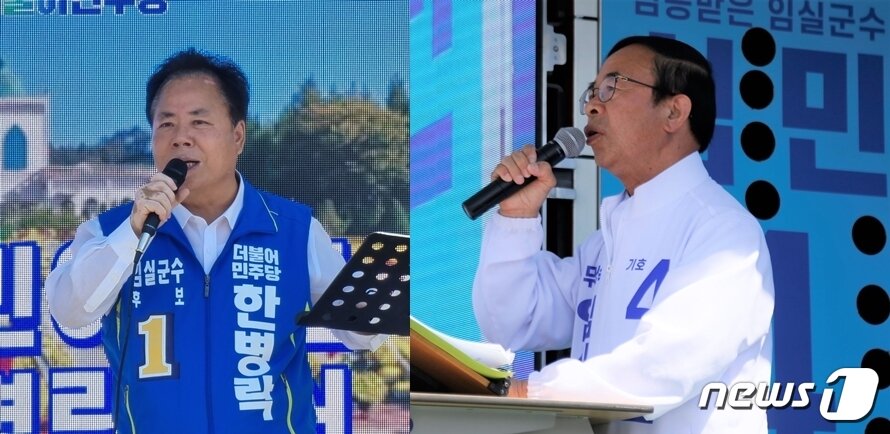 본문 이미지 - 26일 전북 임실군 임실읍 임실시장 앞에서 장날을 맞아 제8회 전국동시지방선거와 관련한 후보들의 유세전이 펼쳐진 가운데 한병락 더불어민주당 후보(사진 왼쪽)와 심민 무소속 후보가 연설을 하고 있다.2022.5.26/ⓒ 뉴스1ⓒ 뉴스1 이지선기자