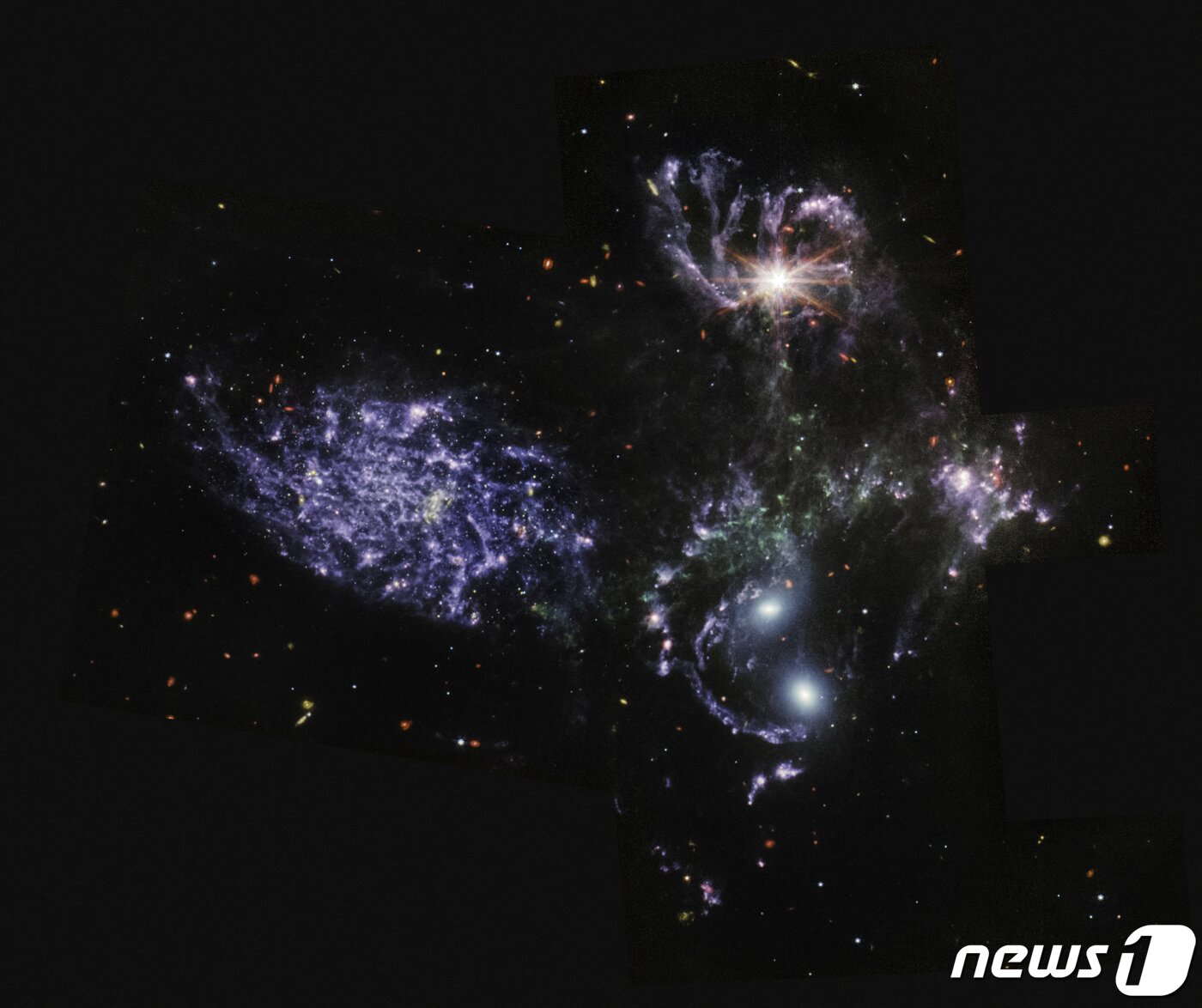본문 이미지 - 미국 항공우주국(NASA)이 제임스웹 우주망원경으로 촬영한 풀컬러 우주사진을 12일(현지시간) 공개했다. 사진은 소은하군 모습. ⓒ 로이터=뉴스1