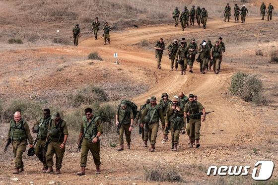 [포토] 수색 후 돌아오는 이스라엘 군인들