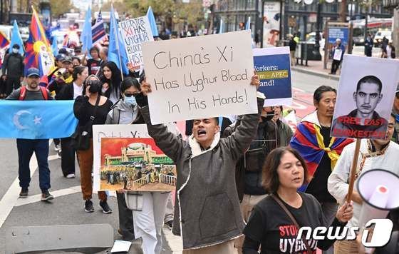 [포토] '티베트에 자유를' 시진핑 美 방문에 시위하는 사람들