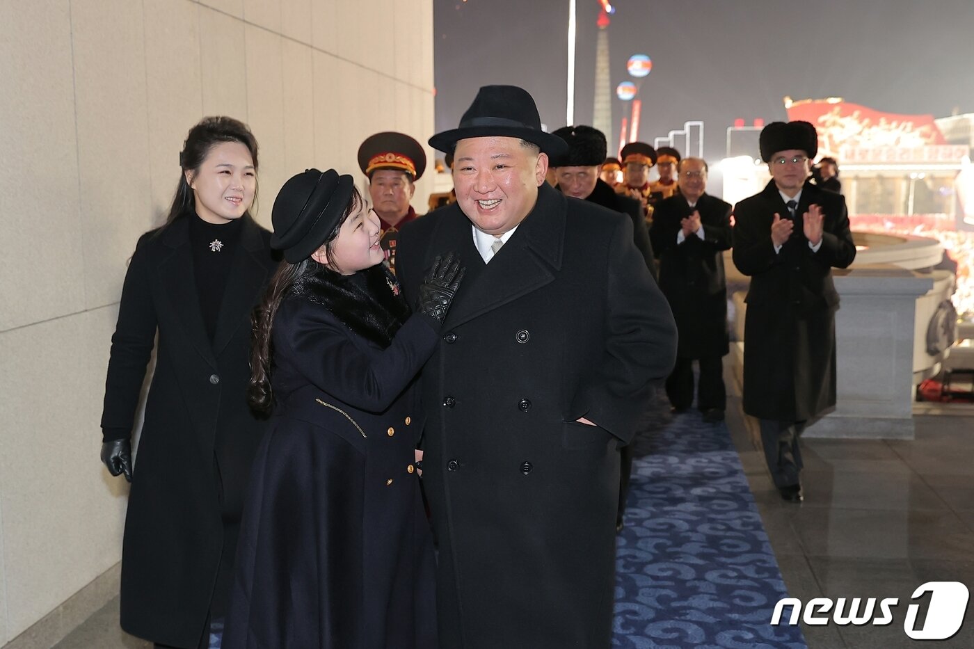 North Korea&#39;s Kim Jong Un, General Secretary of the Workers&#39; Party, descends from the reviewing stand with his daughter Ju-ae after a military parade marking the 75th anniversary of the founding of the Korean People&#39;s Army in February 2023 / Rodong Sinmun