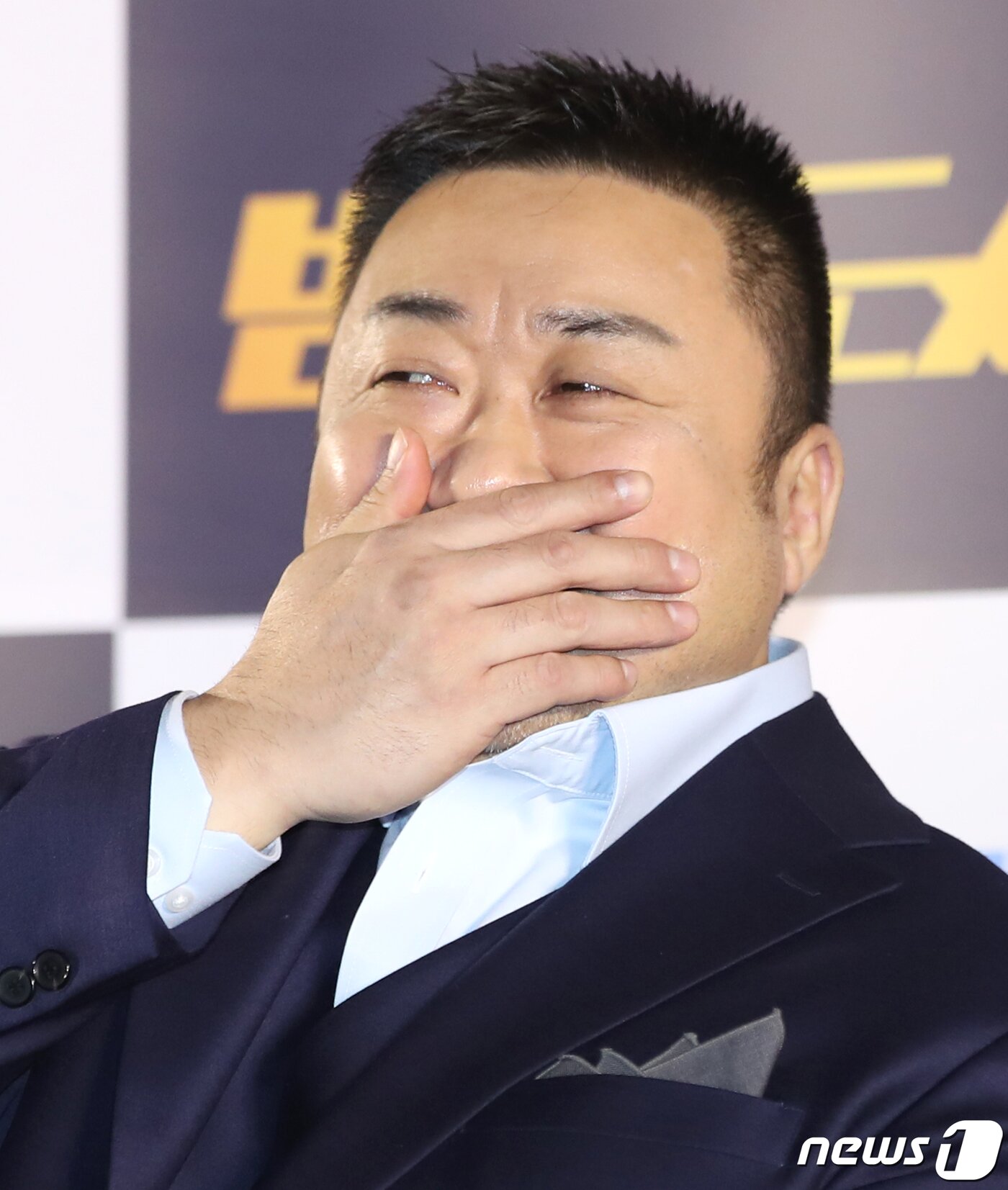 본문 이미지 - 배우 마동석이 22일 오후 서울 강남구 메가박스 코엑스에서 진행된 영화 '범죄도시3' 언론배급시사회에서 미소를 짓고 있다. ‘범죄도시3’는 대체불가 괴물형사 마석도(마동석 분)가 서울 광수대로 이동 후, 신종 마약 범죄 사건의 배후인 주성철(이준혁 분)과 마약 사건에 연루된 또 다른 빌런 리키(아오키 무네타카 분)를 잡기 위해 펼치는 통쾌한 범죄 소탕 작전을 그린 작품이다. 2023.5.22/뉴스1 ⓒ News1 권현진 기자