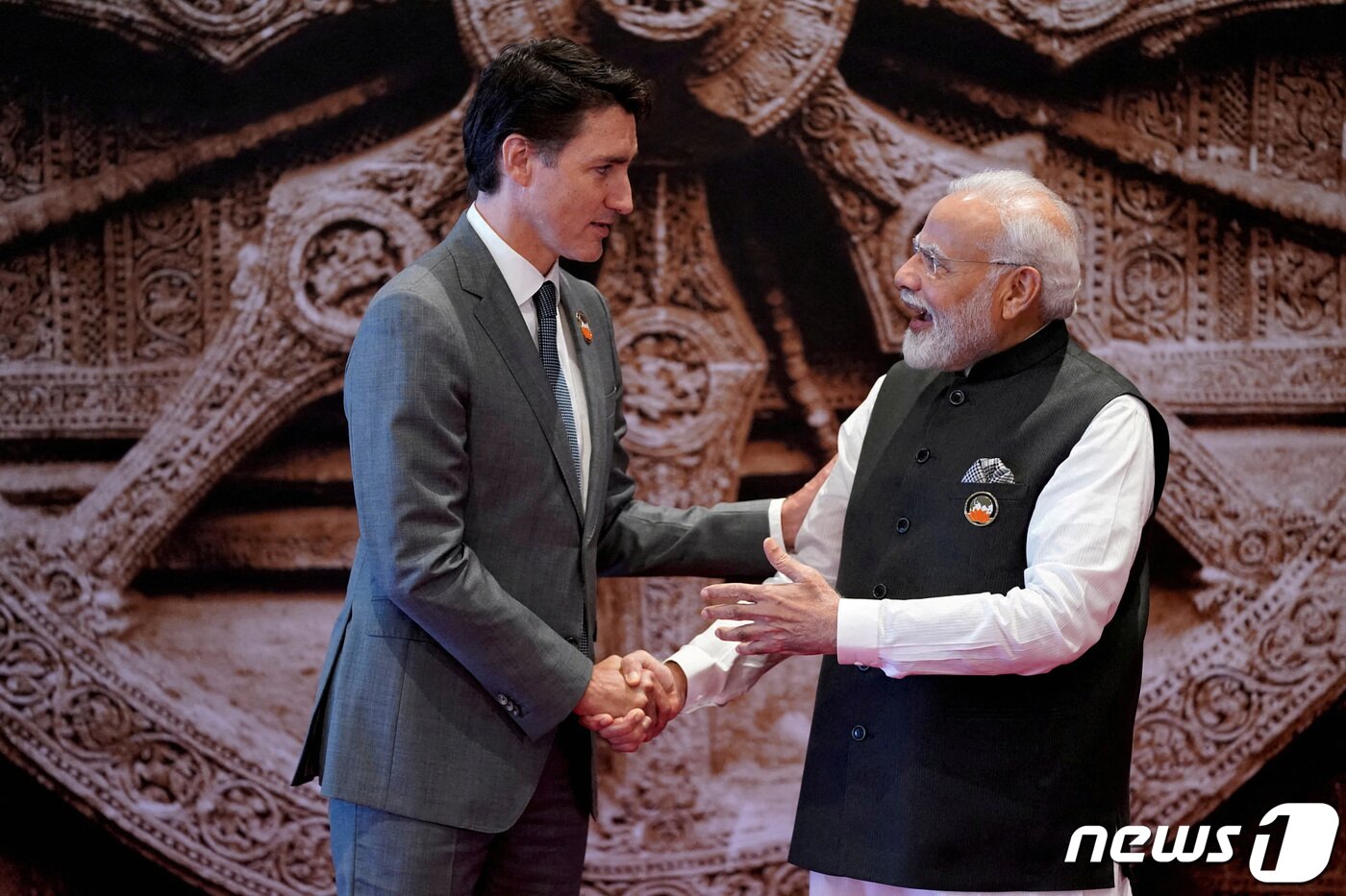 본문 이미지 - 2023년 9월 인도 뉴델리에서 쥐스텡 트뤼도 당시 캐나다 총리가 나렌드라 모디 인도 총리와 악수하고 있다. 이번 만남은 G20 정상회의를 위해 인도에서 이루어졌다. 2023.09.09/ ⓒ 로이터=뉴스1 ⓒ News1 장성희 기자