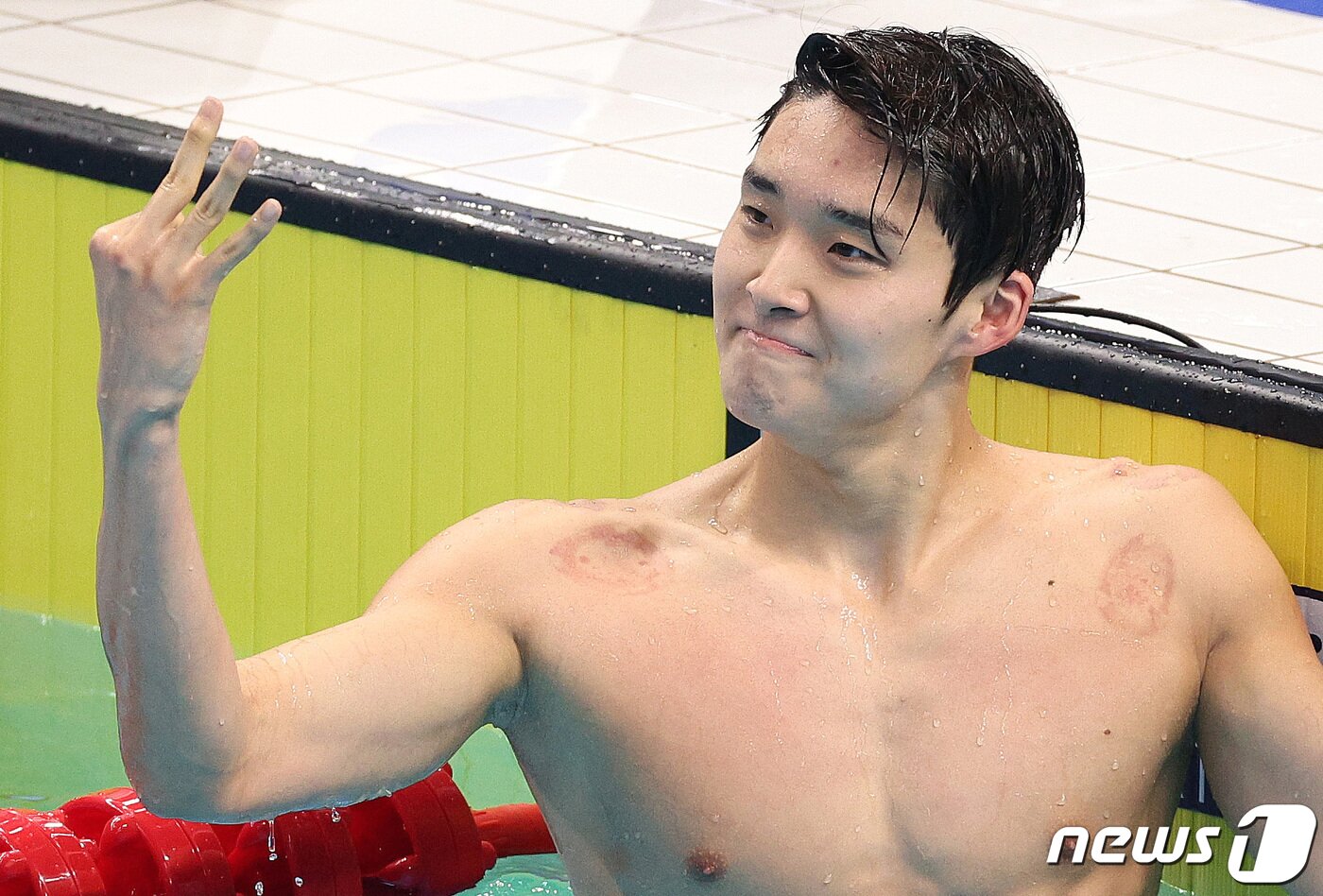 본문 이미지 - 김우민은 2023 항저우 아시안게임에서 3관왕에 올랐다. 2023.9.29/뉴스1 ⓒ News1 신웅수 기자