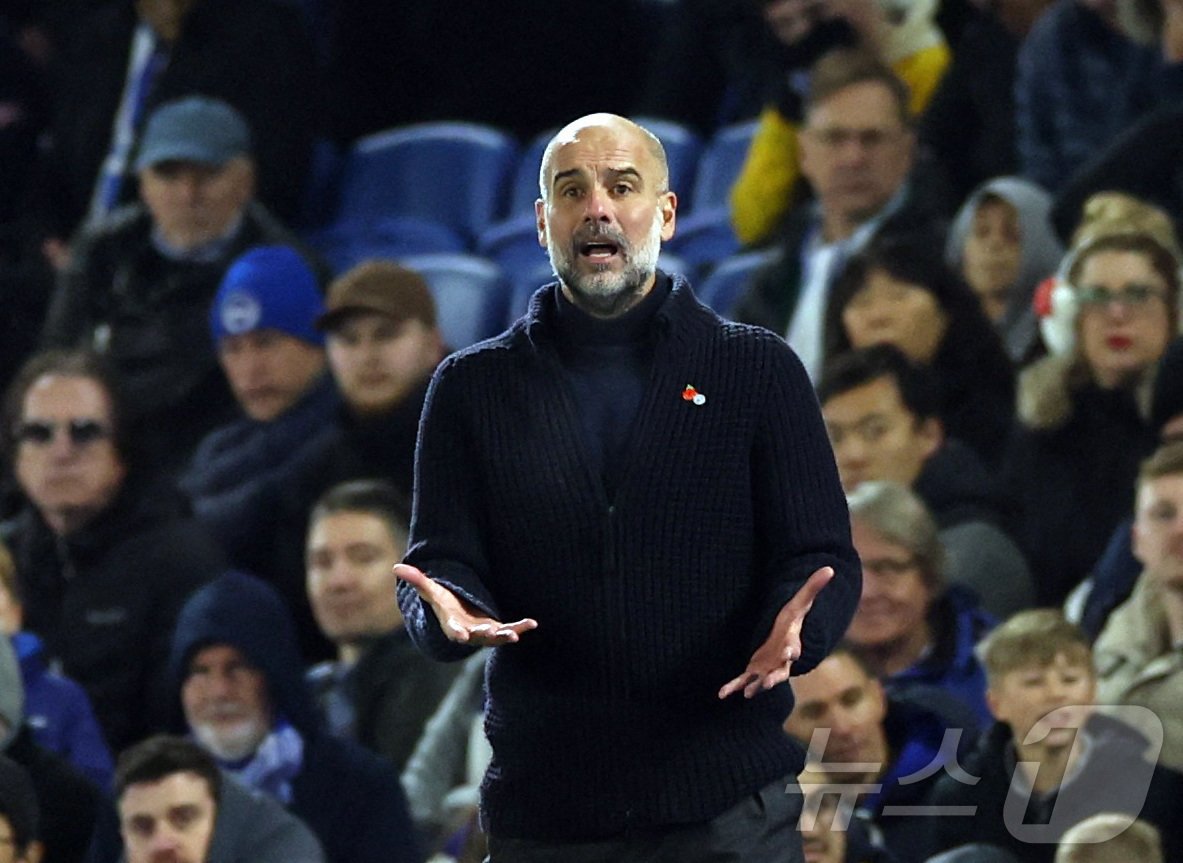 본문 이미지 - 펩 과르디올라 감독이 맨체스터 시티와 계약을 2년 연장했다. ⓒ 로이터=뉴스1