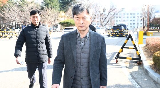 '내란 동조 혐의' 굳은 표정의 국회경비대장