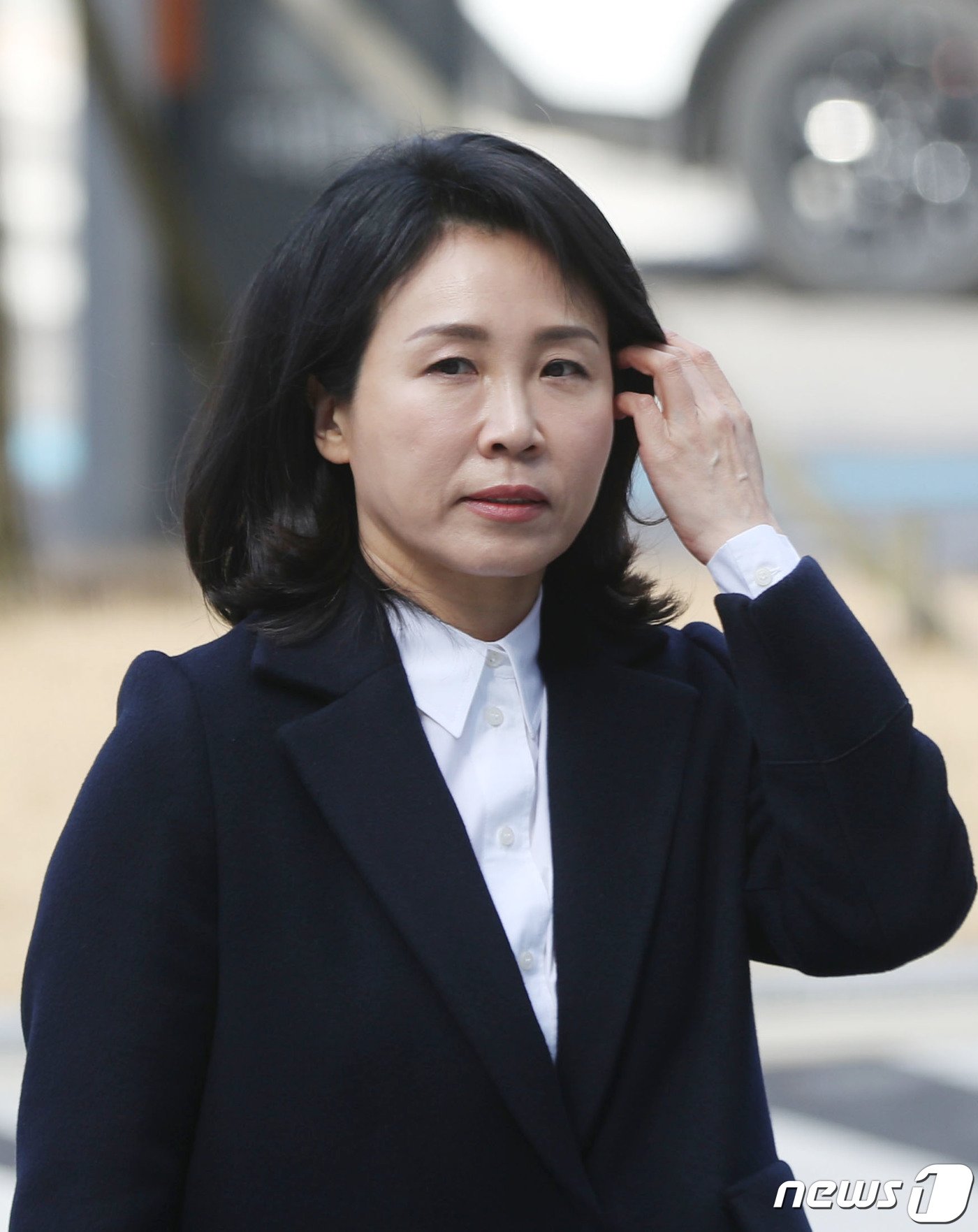 본문 이미지 - ‘공직선거법 위반’ 혐의로 불구속 기소된 더불어민주당 이재명 대표의 배우자 김혜경 씨가 26일 오후 경기 수원시 영통구 수원지방법원에서 열린 첫 공판에 출석하고 있다. 2024.2.26/뉴스1 ⓒ News1 김영운 기자