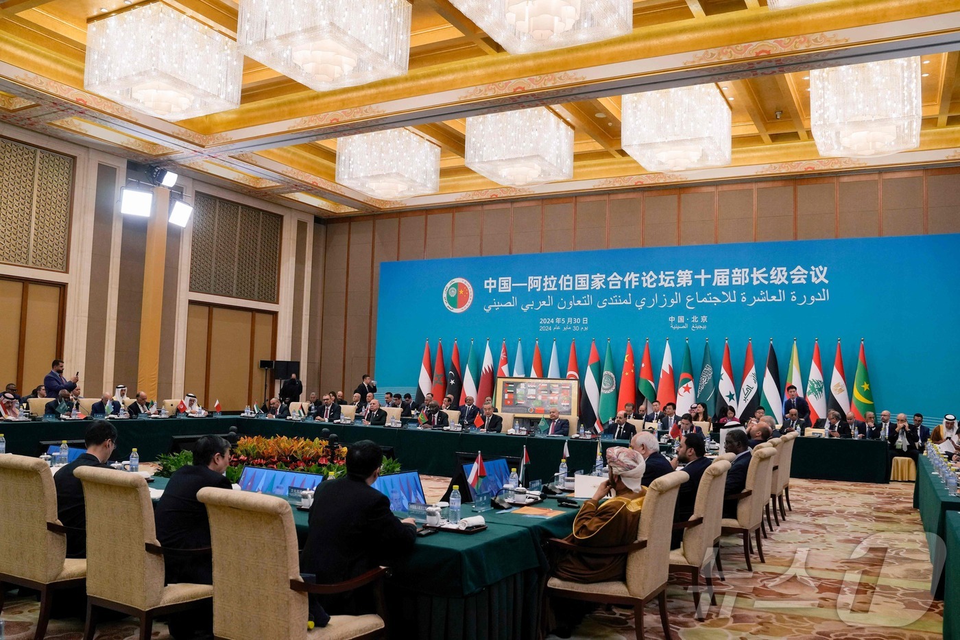 (베이징 AFP=뉴스1) 우동명 기자 = 왕이 중국 외교부장이 30일(현지시간) 베이징 댜오위타이 국빈관에서 열린 중국-아랍국가 협력포럼 제10차 장관급 회의에 참석을 하고 있다. …
