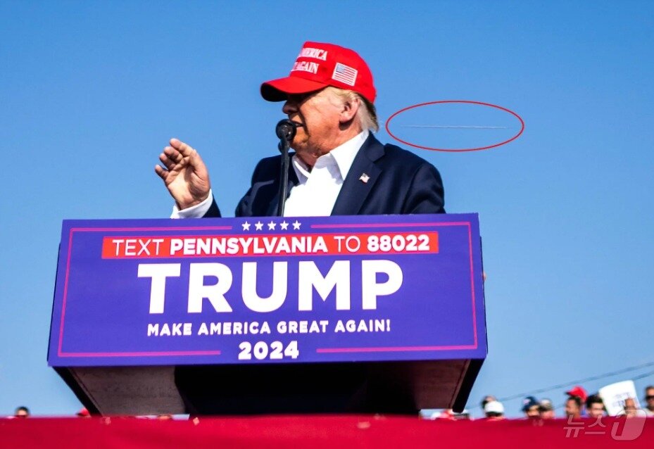 본문 이미지 - 뉴욕타임스 사진기자의 앵글에 잡힌 총탄의 궤적 - NYT 갈무리