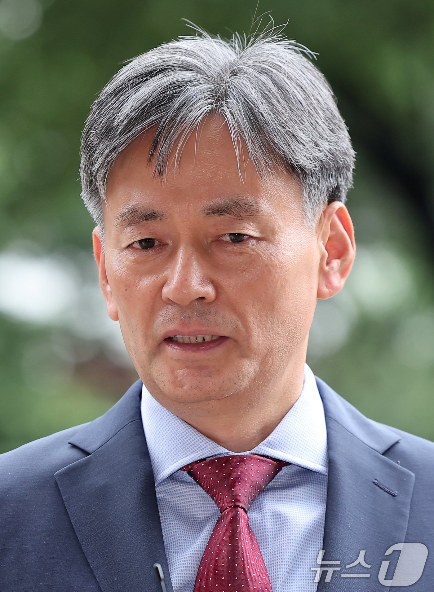 본문 이미지 - 조지호 신임 경찰청장 후보자가 17일 서울 서대문구 NH농협생명빌딩에서 신임 청장 임명제청 동의 여부를 논의하는 국가경찰위원회에 출석하며 취재진의 질문에 답하고 있다. 2024.7.17/뉴스1 ⓒ News1 김성진 기자