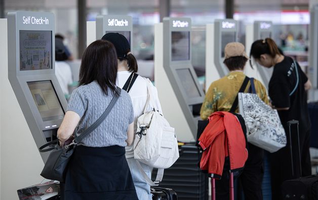 트래블 '카드' 없어도 된다…국민은행 'QR 해외 결제' 서비스 강화