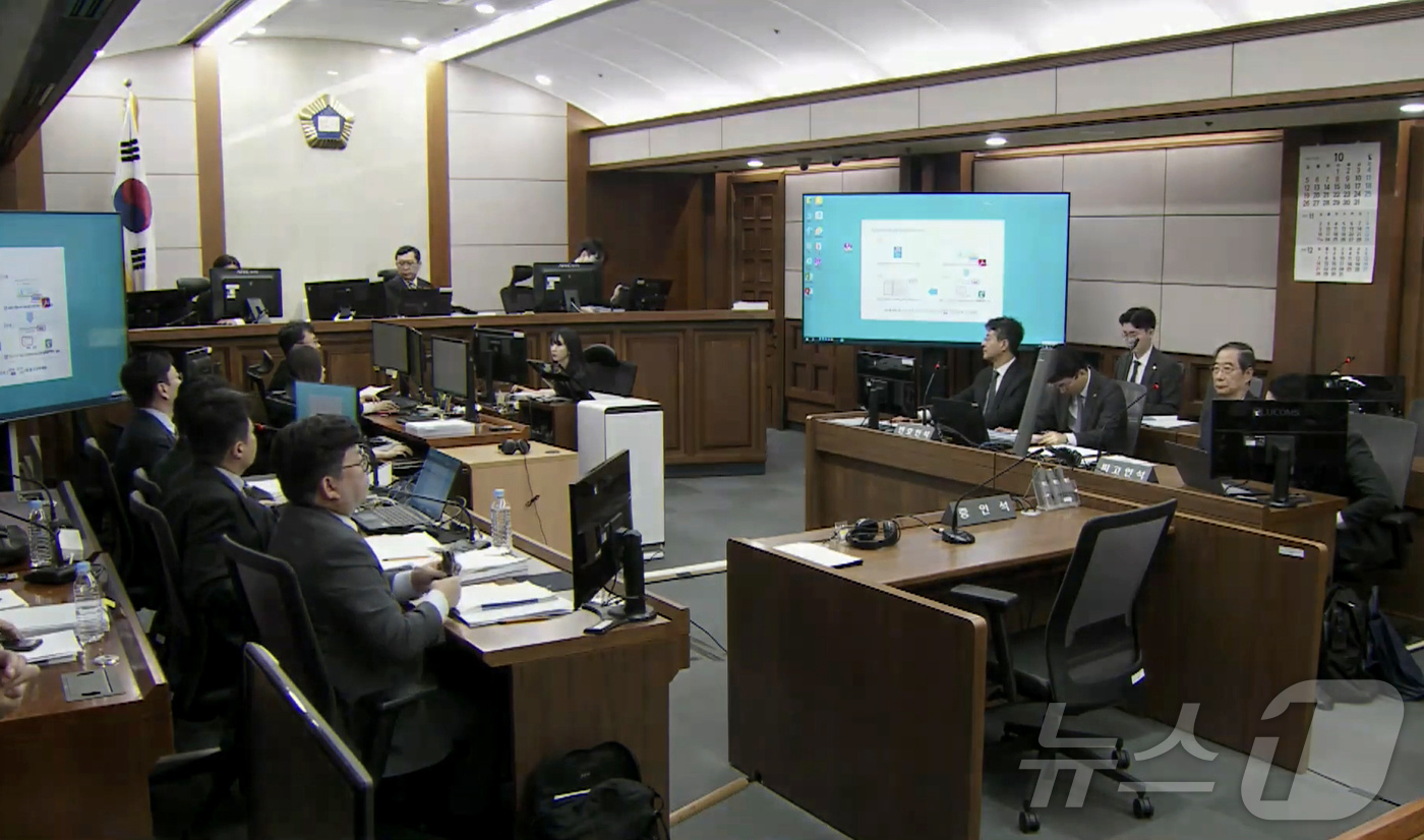 (서울=뉴스1) = 13일 서울 서초구 서울중앙지법에서 한덕수 전 국무총리의 내란 우두머리 방조 혐의 등 2차 공판이 진행되고 있다. (서울중앙지법 제공. 재판매 및 DB금지) 2 …