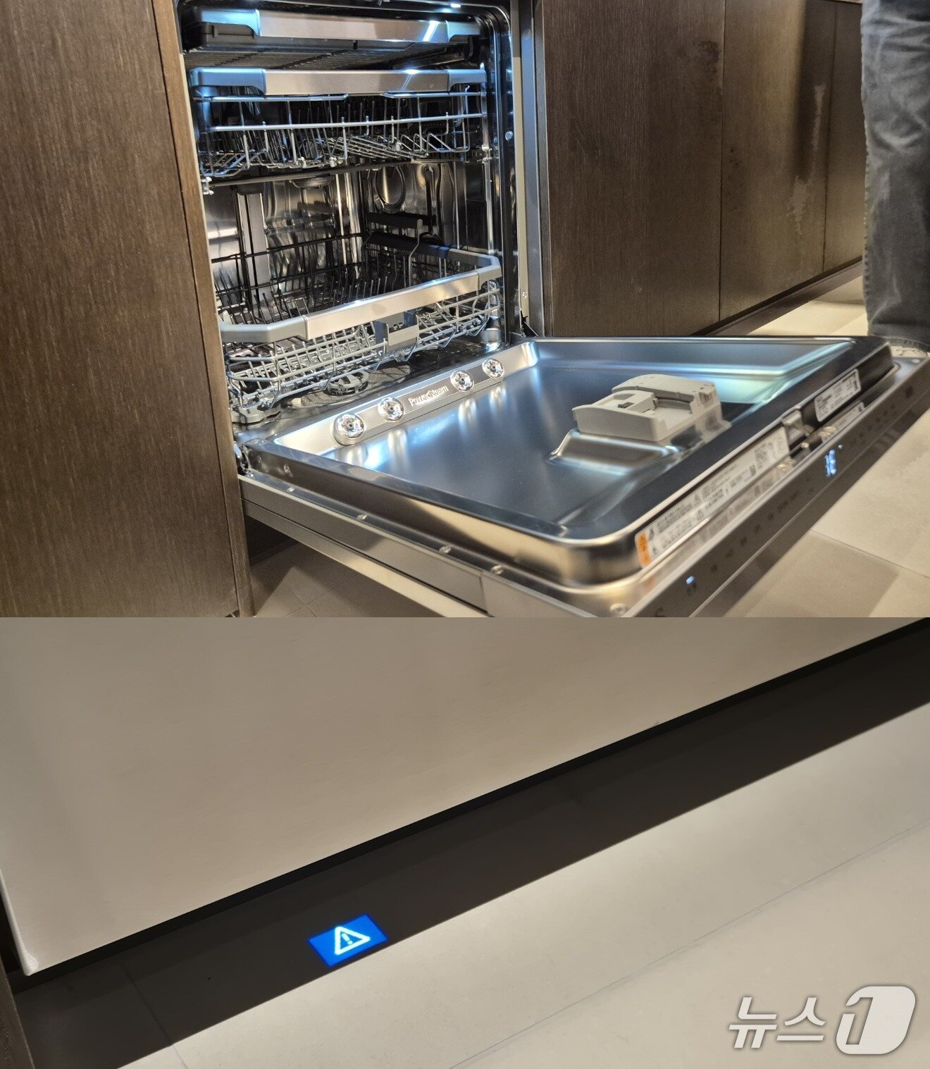 본문 이미지 - LG전자의 초프리미엄 빌트인 가전 브랜드 쇼룸 'SKS 서울'에 전시시된 식기세척기. 바닥에 표시된 불빛으로 진행 상황을 알 수 있다.2025.10.15/뉴스1 최동현 기자