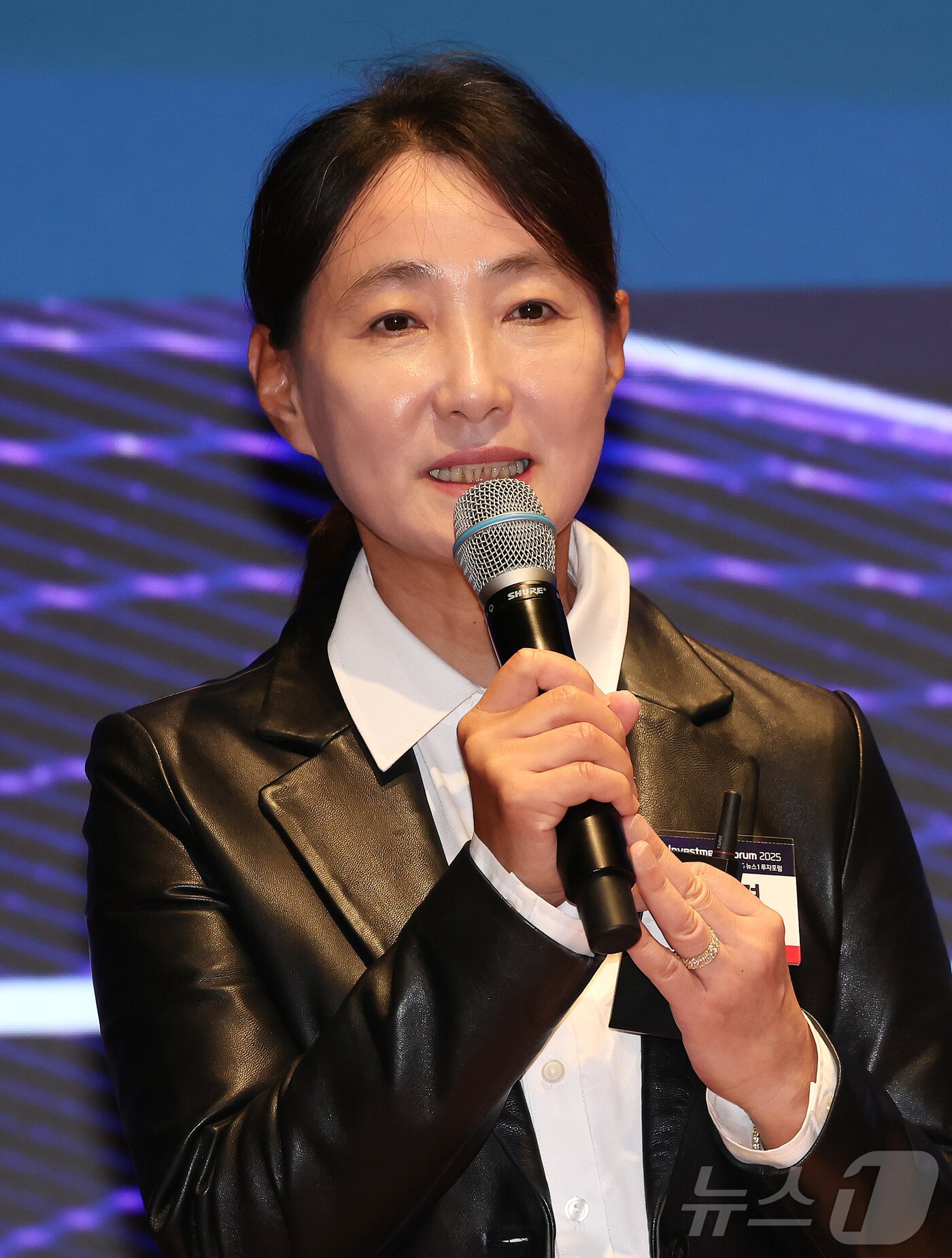 본문 이미지 - 이재경 NH투자증권 리테일사업총괄부문 부사장이 22일 서울 여의도 한국거래소에서 열린 2025 뉴스1 투자포럼&#40;NIF&#41;에서 자본시장으로 머니무브와 증권사의 역할 강화를 주제로 발표하고 있다. 민영뉴스통신사 뉴스1 주최로 열린 이번포럼은 &#39;진짜 성장, 코스피 5000의 길&#39;을 주제로 자본시장 전문가들이 총출동해 정보를 나눈다. 2025.10.22/뉴스1 ⓒ News1 장수영 기자