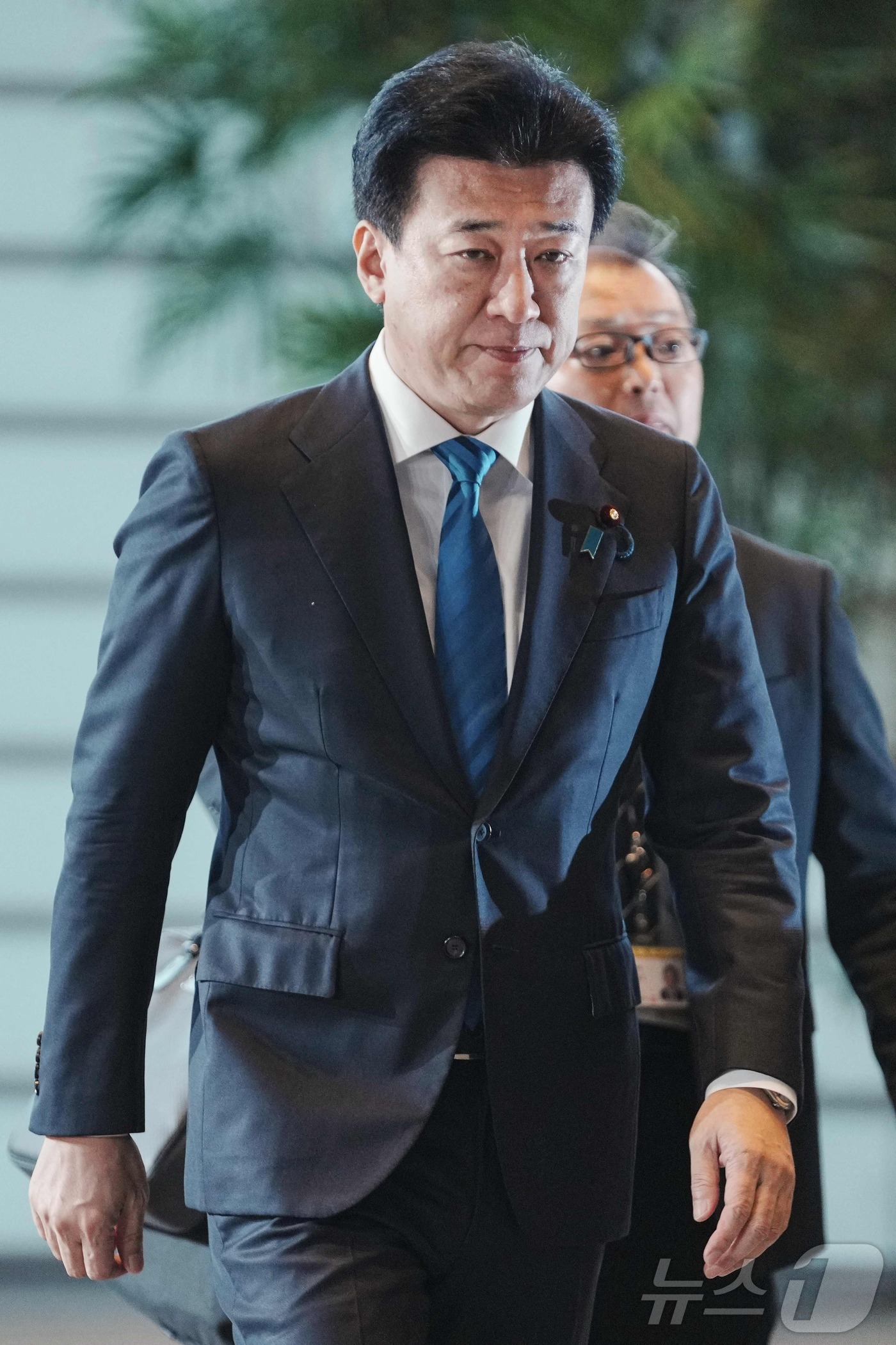 (도쿄 AFP=뉴스1) 김지완 기자 = 21일 일본 정부 대변인인 기하라 미노루 신임 내각관방장관이 도쿄 총리관저에 들어오고 있다. 2025.10.21ⓒ AFP=뉴스1