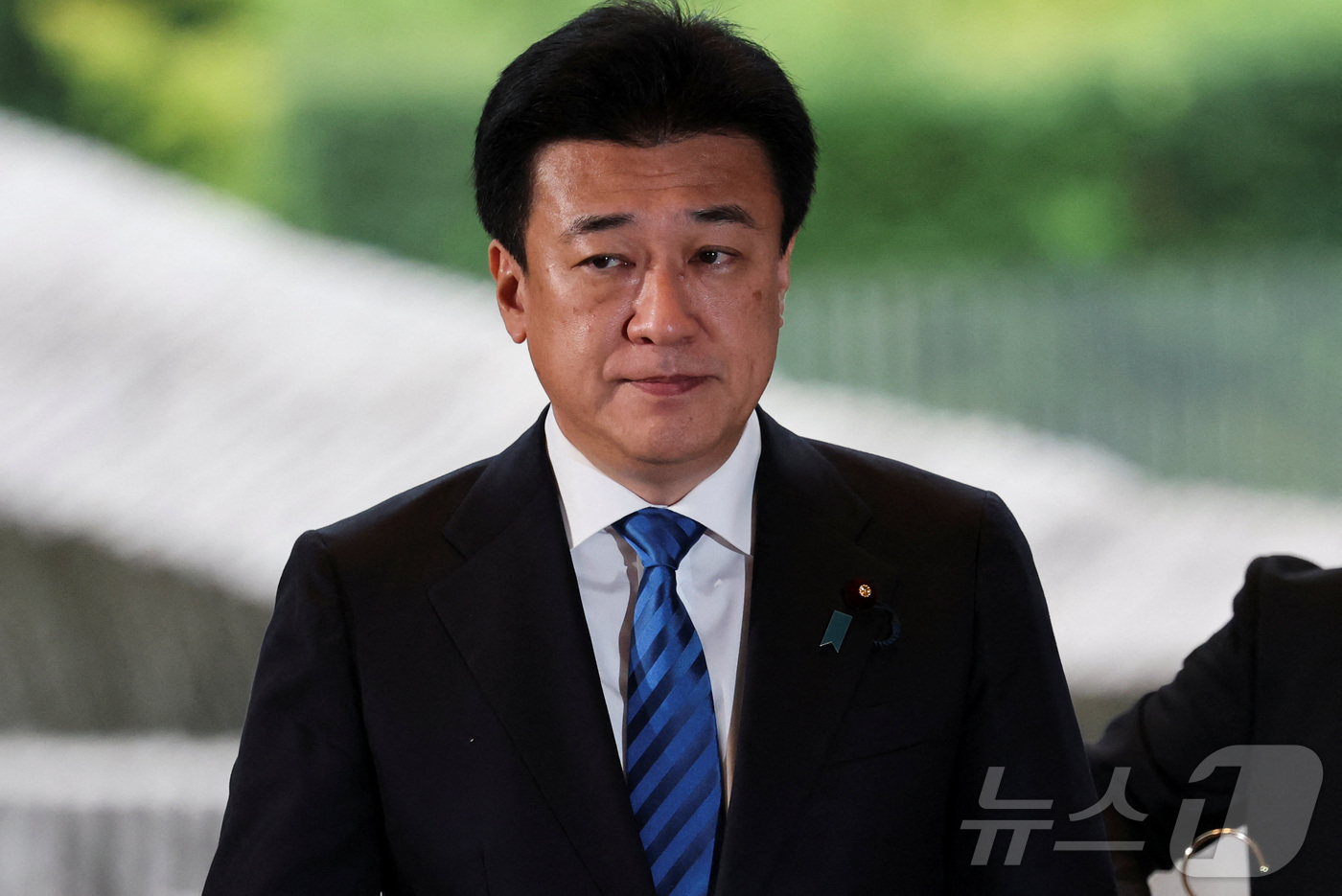 (도쿄 로이터=뉴스1) 강민경 기자 = 기하라 미노루 일본 관방장관이 21일 도쿄 총리 관저에 입장하고 있다. 2025.10.21ⓒ 로이터=뉴스1