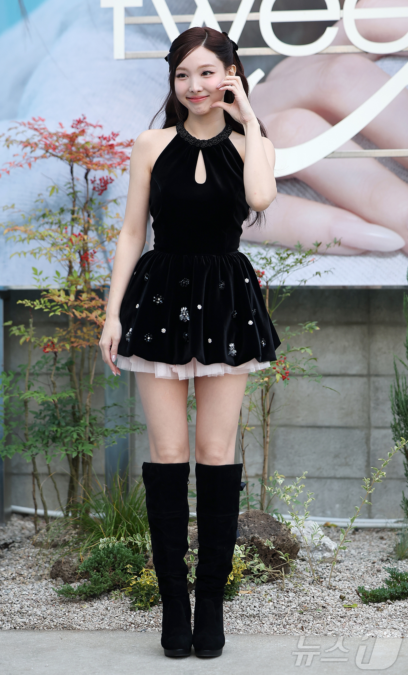 (서울=뉴스1) 김진환 기자 = 트와이스 나연이 20일 오전 서울 성동구 성수동의 한 플래그십 스토어에서 열린 뷰티 브랜드 출시 기념 행사에 참석해 포즈를 취하고 있다. 2025. …