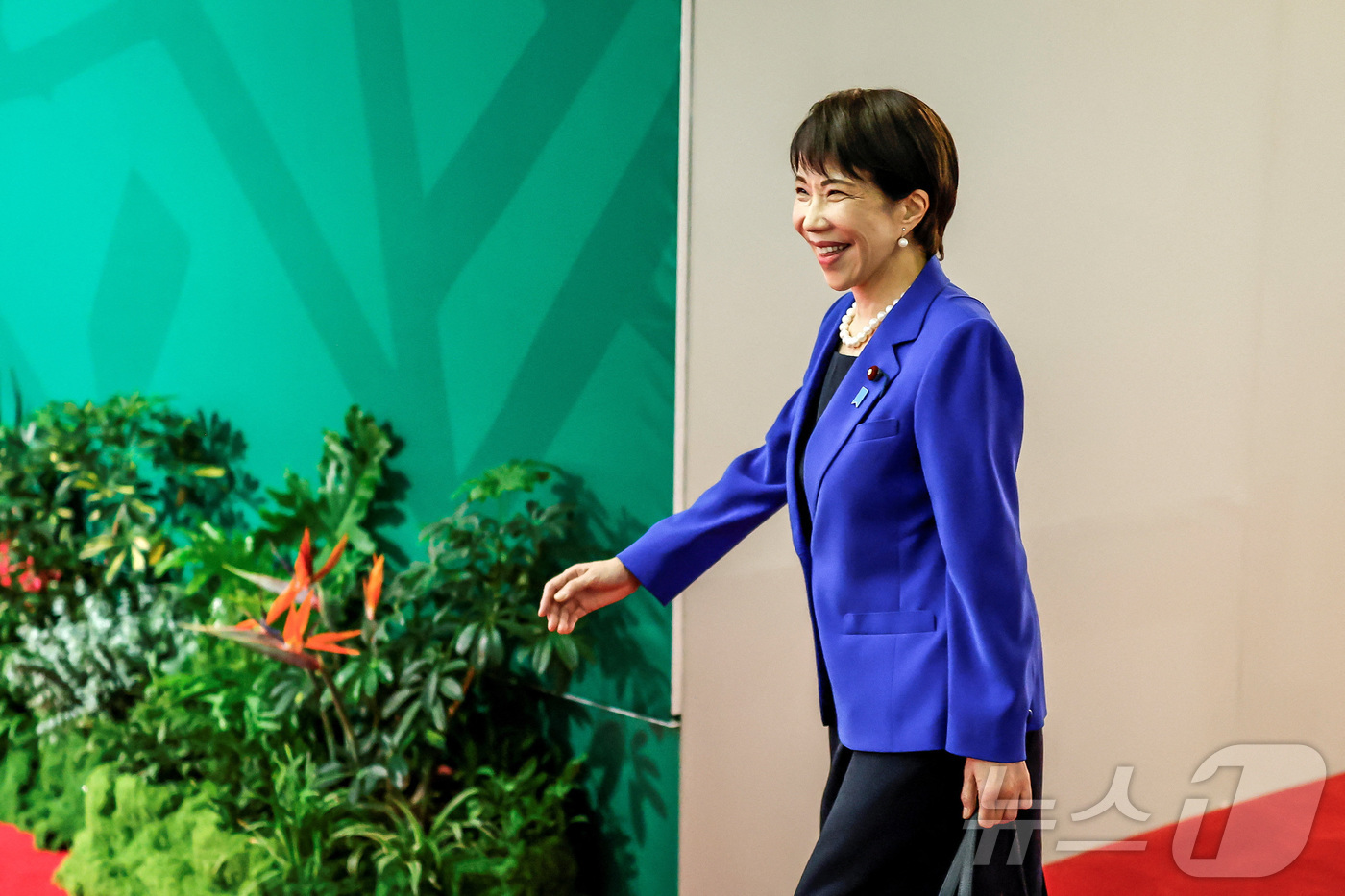 (요하네스버그 로이터=뉴스1) 김지완 기자 = 23일(현지시간) 다카이치 사나에 일본 총리가 주요 20개국(G20) 정상회의가 열리는 남아프리카공화국 요하네스버그 나스렉 엑스포센터 …