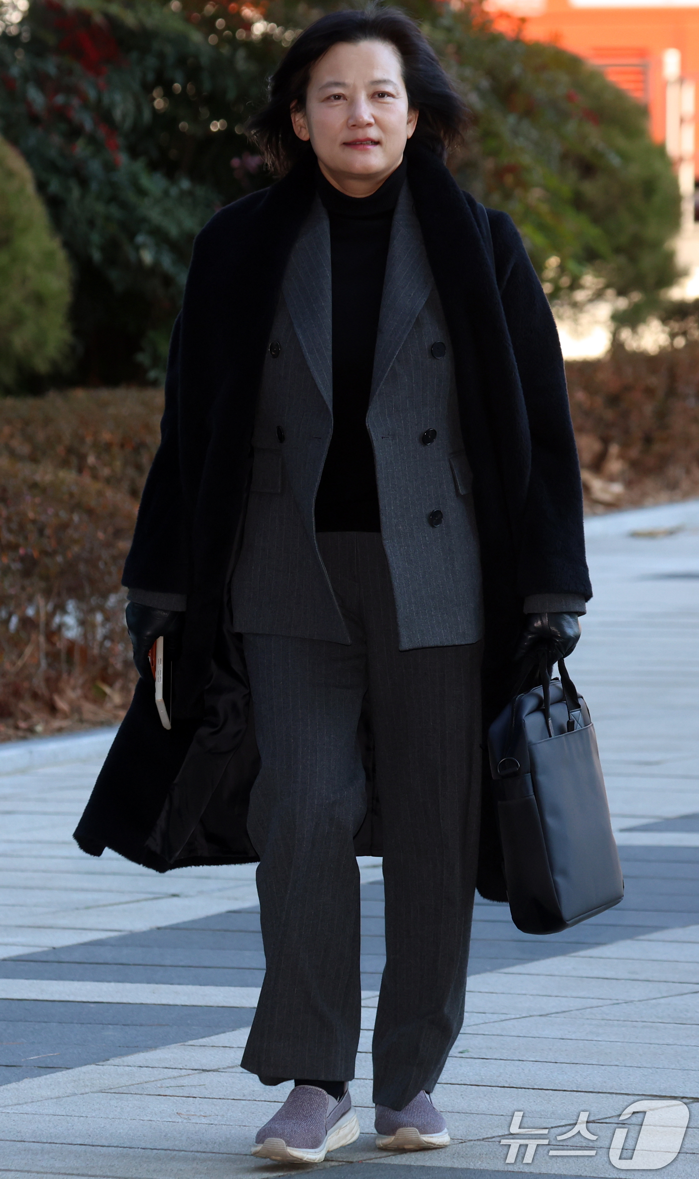 (서울=뉴스1) 김명섭 기자 = 법무부 인사에서 고검검사급 보직으로 사실상 강등된 정유미 검사장이 22일 오전 서울 서초구 서울행정법원에서 열린 인사 효력을 멈춰달라며 낸 집행정지 …