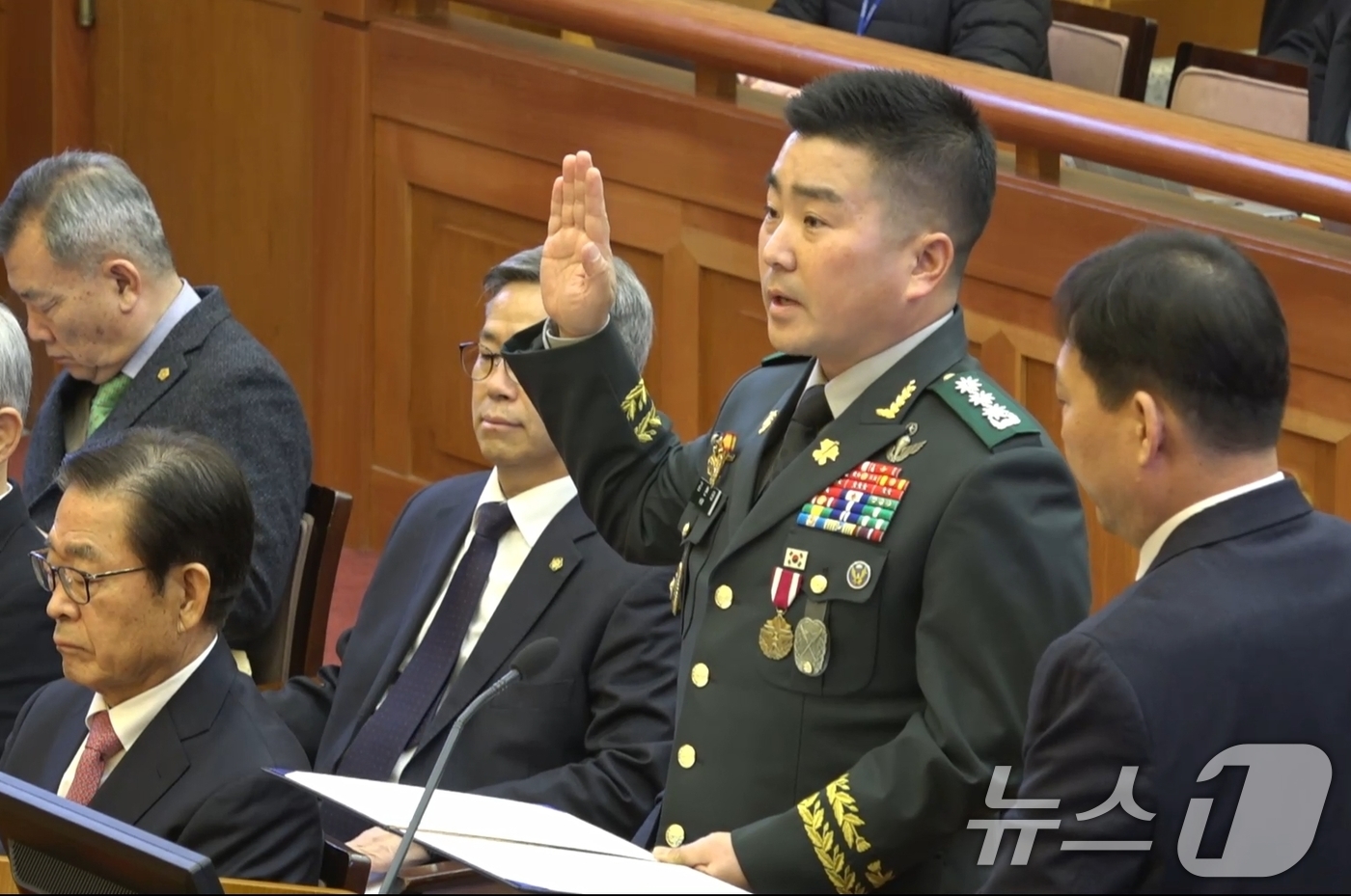 (서울=뉴스1) = 12·3 비상계엄 사태 당시 국회에 투입됐던 707특수임무단을 이끄는 김현태 단장이 6일 서울 종로구 헌법재판소에서 열린 탄핵 심판 6차 변론기일에서 증인선서를 …