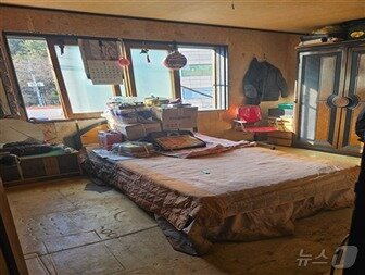 본문 이미지 - 폐기물 정리가 끝난 뒤 김 씨의 집안 내부.(남구 제공)