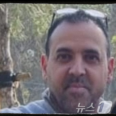 (이스라엘 로이터=뉴스1) 강민경 기자 = 8일 팔레스타인 무장 정파 하마스가 석방한 이스라엘 인질 엘리 샤라비의 납치 전 모습. 2025.2.8ⓒ 로이터=뉴스1